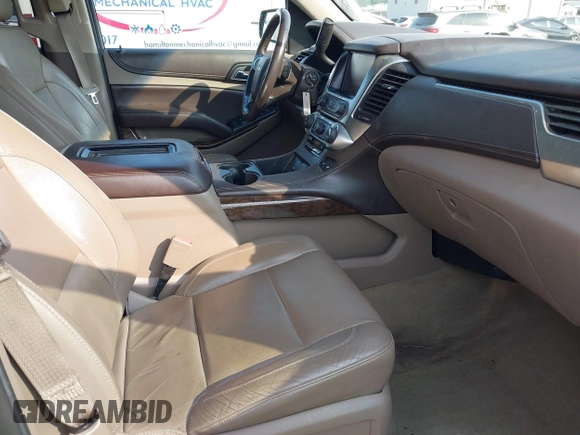 2016 Chevrolet Tahoe LT with VIN 1GNSKBKC4GR288608, listed as a IAAI auction lot 42469898 with 128,364 mi miles and . Bid and sale history available at DreamBid. Image 5.