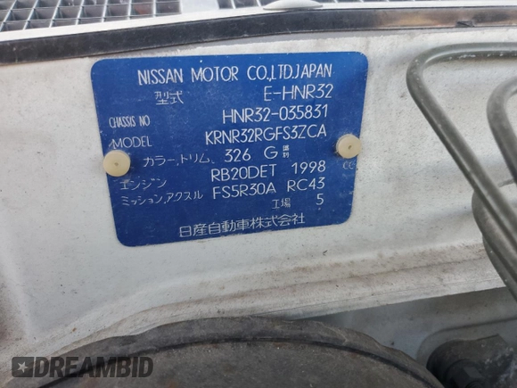 1992 Nissan Skyline z VIN HNR32035831, wystawiony jako Copart lot #74228974 z przebiegiem 49 082 mil mil oraz Szkoda całkowita • Salvage title. Historia ofert i sprzedaży dostępna na DreamBid. Obrazek 12.