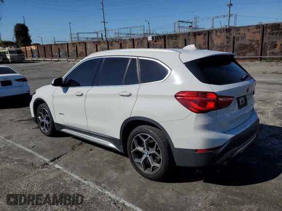 2018 BMW X1 xDrive28i with VIN WBXHT3C34J5K26230, listed as a Copart auction lot 50069465 with 89,520 mi miles and Salvage Title. Bid and sale history available at carsss.com. Image 2.
