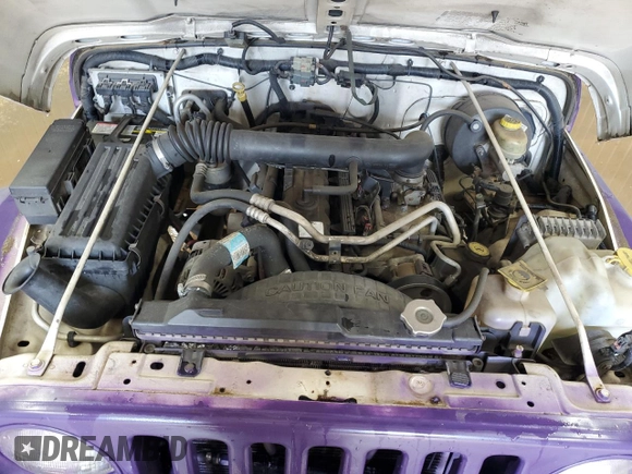 2004 Jeep Wrangler X with VIN 1J4FA39S64P734226, listed as a Copart auction lot 59389795 with 107,373 mi miles and Clean title. Bid and sale history available at DreamBid. Image 12.