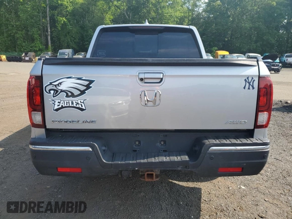 2018 Honda Ridgeline RTL-E with VIN 5FPYK3F77JB014975, listed as a Copart auction lot 59798125 with 124,361 mi miles and Clean title. Bid and sale history available at DreamBid. Image 6.