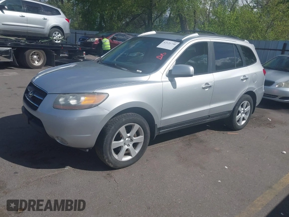 2007 Hyundai Santa Fe SE z VIN 5NMSH73E07H125656, wystawiony jako IAAI lot #42121738 z przebiegiem 171 463 mil mil oraz . Historia ofert i sprzedaży dostępna na DreamBid. Obrazek 2.