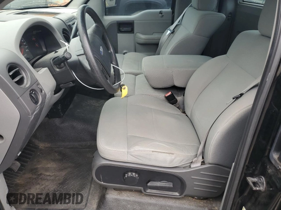 2007 Ford F-150 XL with VIN 1FTRF12207KD50317, listed as a Copart auction lot 58611805 with 122,940 mi miles and Salvage title. Bid and sale history available at DreamBid. Image 7.