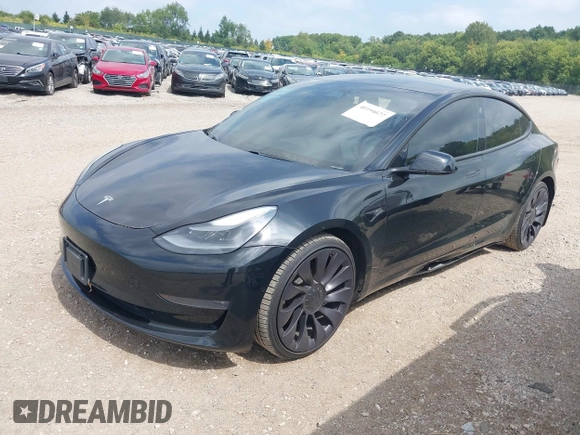 2021 Tesla Model 3 Performance with VIN 5YJ3E1EC5MF919278, listed as a IAAI auction lot 40194677 with 50,484 mi miles and . Bid and sale history available at carsss.com. Image 2.
