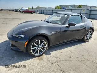 2022 Mazda MX-5 Miata Grand Touring z VIN JM1NDAM77N0503295, wystawiony jako Copart lot #58703795 z przebiegiem 14 237 mil mil oraz Szkoda całkowita • Salvage title. Historia ofert i sprzedaży dostępna na DreamBid. Obrazek 1.