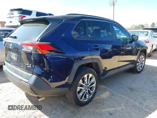 2019 Toyota RAV4 XLE Premium with VIN 2T3A1RFV4KW078806, listed as a IAAI auction lot 41877504 with 99,017 mi miles. Bid and sale history available at carsss.com. Image 4.