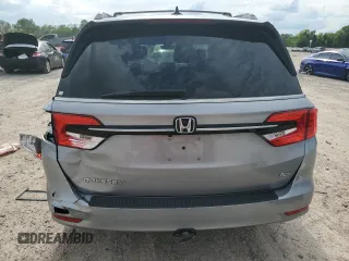 2023 Honda Odyssey EX-L z VIN 5FNRL6H68PB031566, wystawiony jako Copart lot #56232025 z przebiegiem 42 537 mil mil oraz Szkoda całkowita • Salvage title. Historia ofert i sprzedaży dostępna na DreamBid. Obrazek 6.