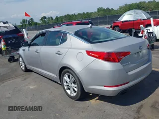 2013 Kia Optima EX with VIN 5XXGN4A75DG092276, listed as a IAAI auction lot 42306138 with 201,649 mi miles and . Bid and sale history available at DreamBid. Image 3.