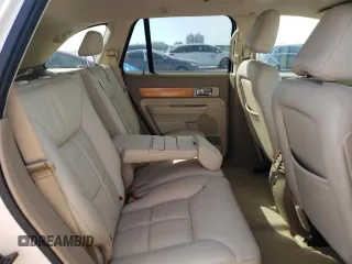2007 Lincoln MKX z VIN 2LMDU68C27BJ22858, wystawiony jako Copart lot #54777825 z przebiegiem 147 548 mil mil oraz Szkoda całkowita • Salvage title. Historia ofert i sprzedaży dostępna na DreamBid. Obrazek 11.