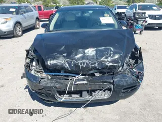 2014 Chevrolet Impala LT with VIN 2G1WB5E30E1156385, listed as a IAAI auction lot 41837008 with 194,732 mi miles and . Bid and sale history available at DreamBid. Image 6.