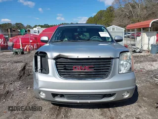 2012 GMC Yukon SLT with VIN 1GKS2CE02CR133683, listed as a IAAI auction lot 41375435 with 197,634 mi miles. Bid and sale history available at carsss.com. Image 12.