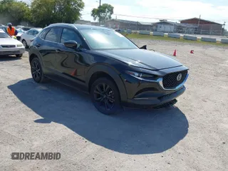 2022 Mazda CX-30 2.5 Turbo with VIN 3MVDMBAY4NM452705, listed as a IAAI auction lot 40101452 with 18,873 mi miles and . Bid and sale history available at carsss.com. Image 1.