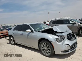 2020 Chrysler 300 S with VIN 2C3CCAGGXLH154801, listed as a Copart auction lot 58155674 with 98,028 mi miles and Salvage Title. Bid and sale history available at DreamBid. Image 4.