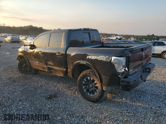 2019 Nissan Titan Pro-4X z VIN 1N6AA1E53KN525603, wystawiony jako Copart lot #77336264 z przebiegiem 64 507 mil mil oraz Szkoda całkowita • Salvage title. Historia ofert i sprzedaży dostępna na DreamBid. Obrazek 2.
