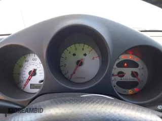 2002 Toyota MR2 z VIN JTDFR320120045045, wystawiony jako IAAI lot #42227577 z przebiegiem 128 095 mil mil oraz . Historia ofert i sprzedaży dostępna na DreamBid. Obrazek 7.