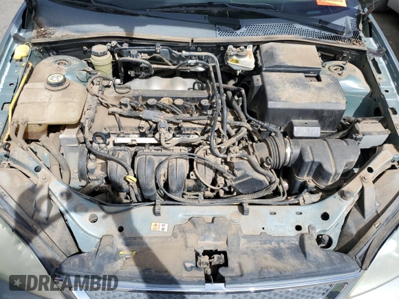 2005 Ford Focus S with VIN 1FAFP34N35W235922, listed as a Copart auction lot 54729854 with Not Provided miles and Salvage Title. Bid and sale history available at carsss.com. Image 11.