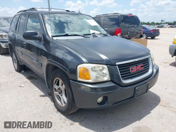 2005 GMC Envoy SLE with VIN 1GKDS13SX52373187, listed as a IAAI auction lot 42434190 with 112,965 mi miles and . Bid and sale history available at DreamBid. Image 1.