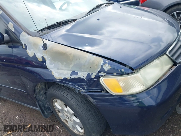 2004 Honda Odyssey EX-L with VIN 5FNRL189X4B045588, listed as a IAAI auction lot 41928397 with 218,182 mi miles and . Bid and sale history available at DreamBid. Image 6.