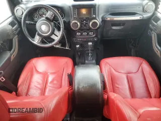 2016 Jeep Wrangler Unlimited 75th Anniversary with VIN 1C4HJWEG3GL198641, listed as a Copart auction lot 55892035 with 128,702 mi miles and Salvage title. Bid and sale history available at DreamBid. Image 8.