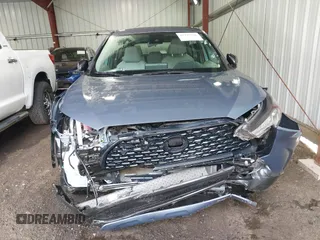 2022 Toyota Corolla Cross L with VIN 7MUAAAAG9NV034659, listed as a IAAI auction lot 42125356 with 14,631 mi miles and . Bid and sale history available at DreamBid. Image 12.