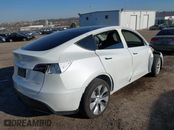 2023 Tesla Model Y Long Range z VIN 7SAYGDEE5PF765326, wystawiony jako IAAI lot #41757113 z przebiegiem 10 461 mil mil oraz . Historia ofert i sprzedaży dostępna na DreamBid. Obrazek 4.