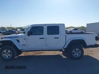 2020 Jeep Gladiator Rubicon with VIN 1C6JJTBG6LL187235, listed as a IAAI auction lot 42010374 with Not Provided miles and . Bid and sale history available at DreamBid. Image 14.