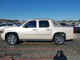 2010 Chevrolet Avalanche LTZ with VIN 3GNNCGE04AG125909, listed as a IAAI auction lot 41666145 with 92,395 mi miles and . Bid and sale history available at DreamBid. Image 14.
