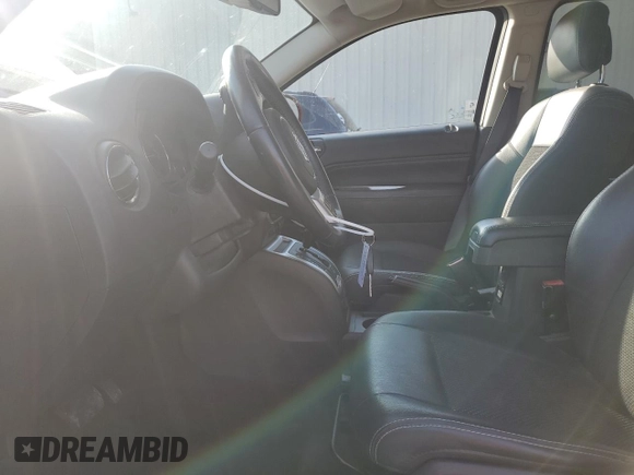 2016 Jeep Compass Latitude with VIN 1C4NJCEB7GD543444, listed as a Copart auction lot 84266844 with 61,564 mi miles and Salvage Title. Bid and sale history available at carsss.com. Image 7.