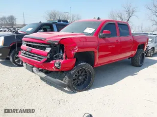 2016 Chevrolet Silverado 1500 LT with VIN 3GCUKREC0GG132961, listed as a IAAI auction lot 41764882 with 109,310 mi miles. Bid and sale history available at carsss.com. Image 2.