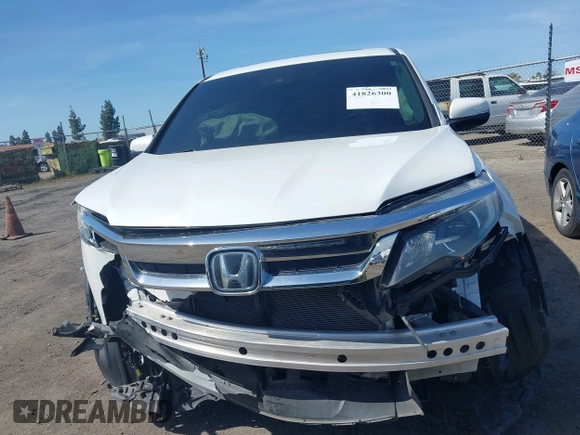 2020 Honda Pilot EX-L with VIN 5FNYF5H59LB027265, listed as a IAAI auction lot 41826300 with 57,201 mi miles. Bid and sale history available at carsss.com. Image 13.