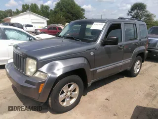 2012 Jeep Liberty Sport with VIN 1C4PJMAKXCW107531, listed as a IAAI auction lot 42155945 with 166,188 mi miles and . Bid and sale history available at carsss.com. Image 2.