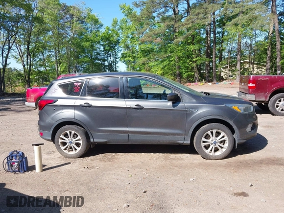 2019 Ford Escape SE z VIN 1FMCU9GD7KUB23316, wystawiony jako IAAI lot #42138654 z przebiegiem 145 857 mil mil oraz . Historia ofert i sprzedaży dostępna na DreamBid. Obrazek 13.