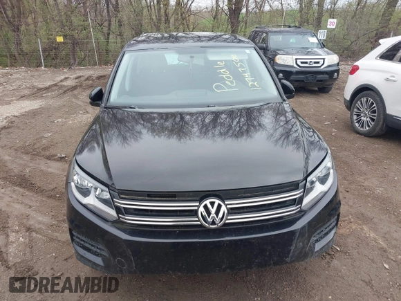 2012 Volkswagen Tiguan SE with VIN WVGAV7AX7CW609609, listed as a IAAI auction lot 41947280 with 77,942 mi miles and . Bid and sale history available at DreamBid. Image 6.