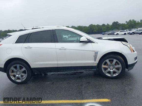 2012 Cadillac SRX Performance Collection with VIN 3GYFNBE38CS547423, listed as a IAAI auction lot 42276365 with 157,786 mi miles and . Bid and sale history available at DreamBid. Image 13.