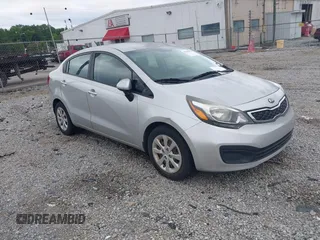 2013 Kia Rio EX with VIN KNADN4A32D6310234, listed as a IAAI auction lot 42518870 with 125,605 mi miles and . Bid and sale history available at DreamBid. Image 1.