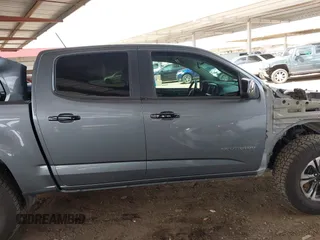 2021 Chevrolet Colorado 4WD Z71 z VIN 1GCGTDEN1M1168618, wystawiony jako IAAI lot #41683565 z przebiegiem 57 697 mil mil oraz . Historia ofert i sprzedaży dostępna na DreamBid. Obrazek 14.