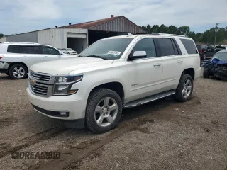 2015 Chevrolet Tahoe LTZ with VIN 1GNSCCKC9FR646299, listed as a Copart auction lot 58607865 with 204,663 mi miles and Salvage title. Bid and sale history available at DreamBid. Image 1.