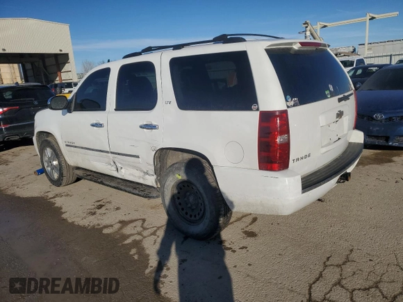 2009 Chevrolet Tahoe LTZ with VIN 1GNFK33099R197350, listed as a Copart auction lot 86149474 with 195,703 mi miles and Salvage title. Bid and sale history available at DreamBid. Image 2.