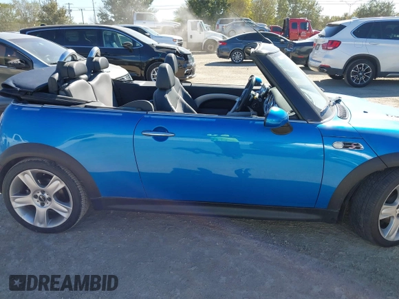 2007 MINI Convertible S with VIN WMWRH33547TL94374, listed as a IAAI auction lot 40910780 with 45,162 mi miles and . Bid and sale history available at DreamBid. Image 13.