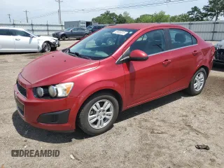 2015 Chevrolet Sonic LT with VIN 1G1JC5SHXF4130938, listed as a Copart auction lot 59965815 with 137,738 mi miles and Salvage title. Bid and sale history available at DreamBid. Image 1.
