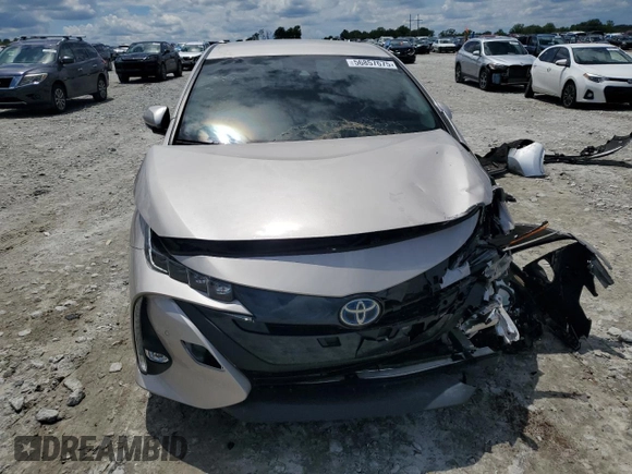 2021 Toyota Prius LE with VIN JTDKAMFPXM3184126, listed as a Copart auction lot 56857675 with 54,676 mi miles and Clean Title. Bid and sale history available at DreamBid. Image 5.