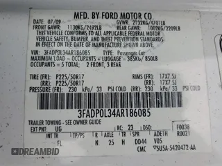 2010 Ford Fusion Hybrid z VIN 3FADP0L34AR186085, wystawiony jako Copart lot #55291735 z przebiegiem 282 029 mil mil oraz Szkody całkowita. Historia ofert i sprzedaży dostępna na DreamBid. Obrazek 12.