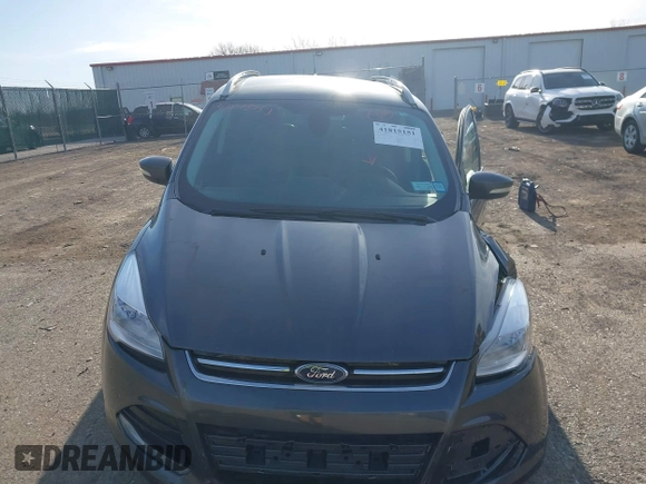 2015 Ford Escape Titanium with VIN 1FMCU9J90FUB58306, listed as a IAAI auction lot 41815151 with 136,835 mi miles. Bid and sale history available at carsss.com. Image 12.