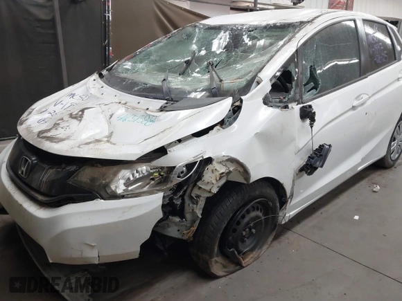 2016 Honda Fit LX with VIN JHMGK5H5XGX021847, listed as a IAAI auction lot 41651588 with 18,140 mi miles. Bid and sale history available at carsss.com. Image 6.