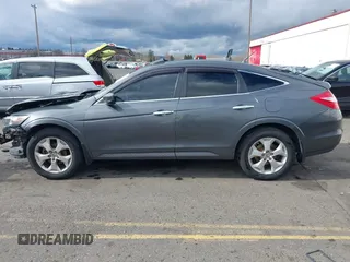 2012 Honda Crosstour EX-L z VIN 5J6TF2H52CL010520, wystawiony jako IAAI lot #41702638 z przebiegiem 177 464 mil mil oraz . Historia ofert i sprzedaży dostępna na DreamBid. Obrazek 14.