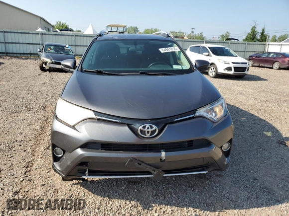 2016 Toyota RAV4 XLE with VIN JTMRFREV0GJ082234, listed as a Copart auction lot 64941855 with 193,270 mi miles and Salvage title. Bid and sale history available at DreamBid. Image 5.