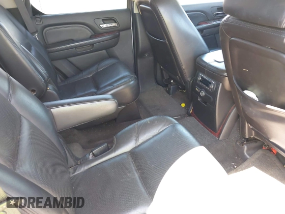 2007 Cadillac Escalade z VIN 1GYFK63827R299936, wystawiony jako IAAI lot #42254274 z przebiegiem 193 798 mil mil oraz . Historia ofert i sprzedaży dostępna na DreamBid. Obrazek 8.