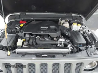 2022 Jeep Gladiator Willys with VIN 1C6JJTAMXNL137237, listed as a IAAI auction lot 41947651 with 55,199 mi miles and . Bid and sale history available at DreamBid. Image 10.