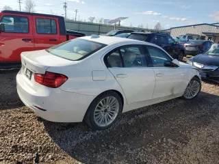 2012 BMW 3 Series 328i with VIN WBA3A5C55CF257491, listed as a Copart auction lot 51131705 with 187,130 mi miles and Salvage Title. Bid and sale history available at carsss.com. Image 3.