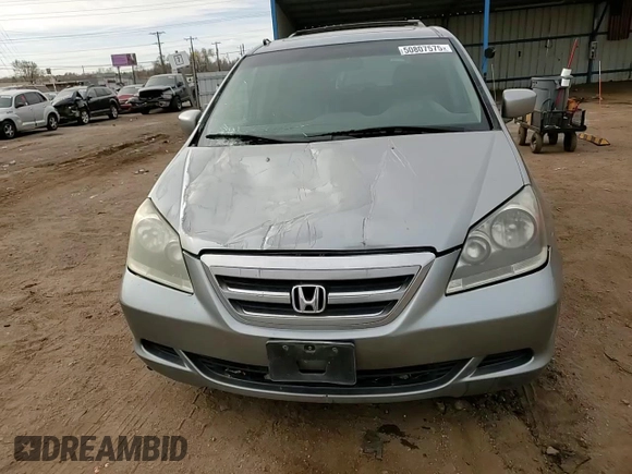 2005 Honda Odyssey EX-L with VIN 5FNRL38715B116530, listed as a Copart auction lot 50807575 with 216,434 mi miles and Salvage Title. Bid and sale history available at DreamBid. Image 12.